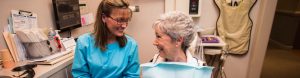 dental staff and a dental patient